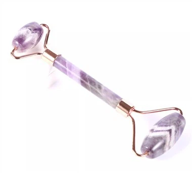 بكرة اليشم للوجه من الكريستال الطبيعي باللون الذهبي الوردي